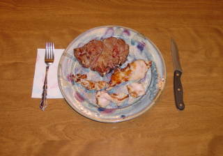 Grilled Lamb Shoulder Steak with Grilled Pork Fat.